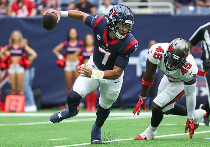 Nov. 5, 2023: Houston Texans rookie quarterback C.J. Stroud (7) tries to re-gain balance during a play against the Tampa Bay Buccaneers at NRG Stadium.